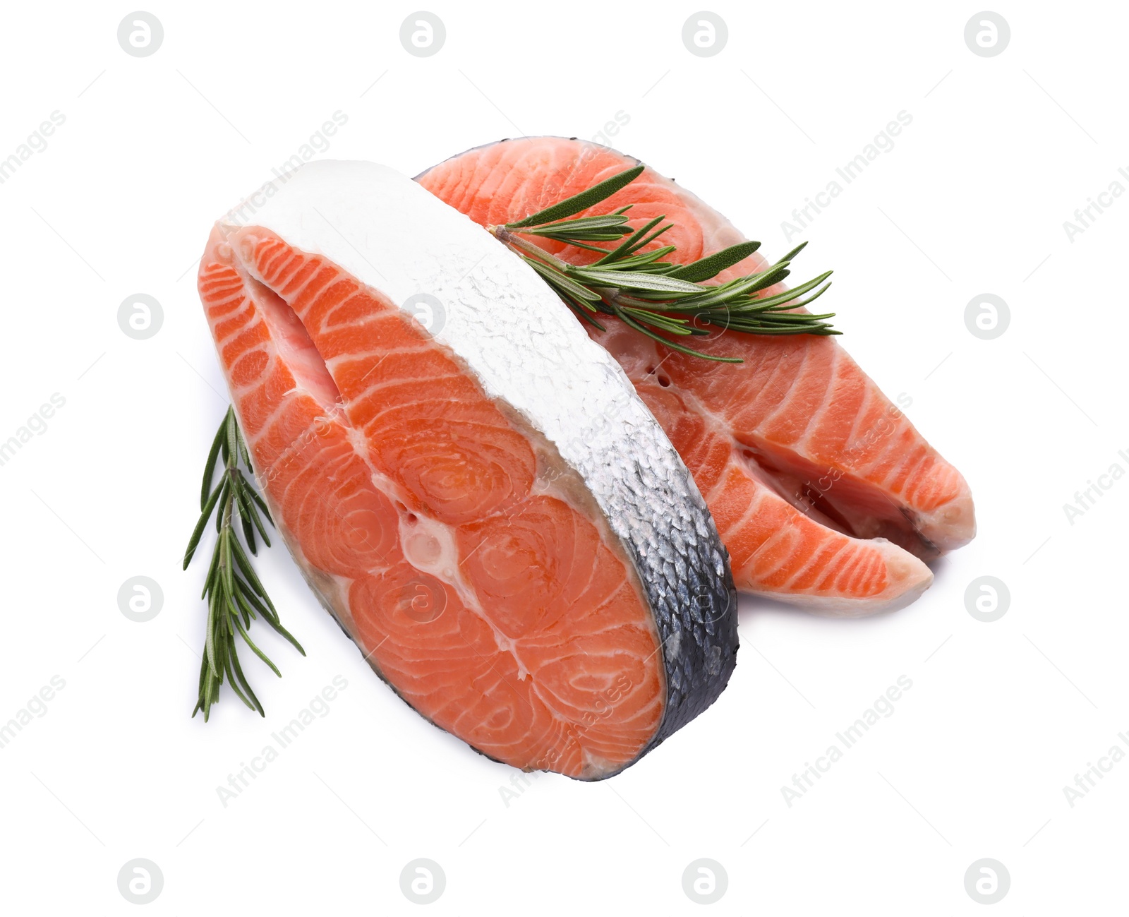 Photo of Fresh raw salmon steaks with rosemary on white background, top view