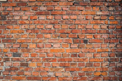 Texture of old red brick wall as background