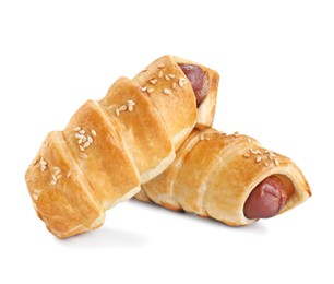 Photo of Delicious homemade sausage rolls isolated on white