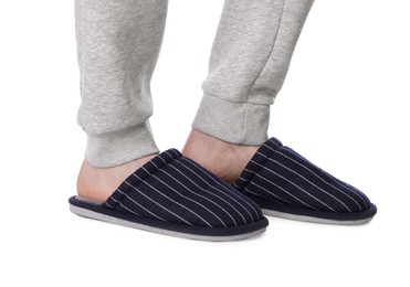 Man in soft slippers on white background, closeup