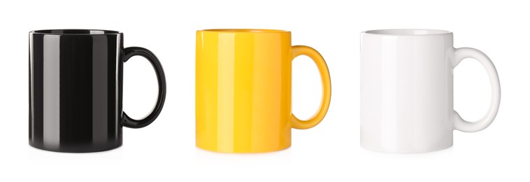 Set with different ceramic mugs on white background. Banner design