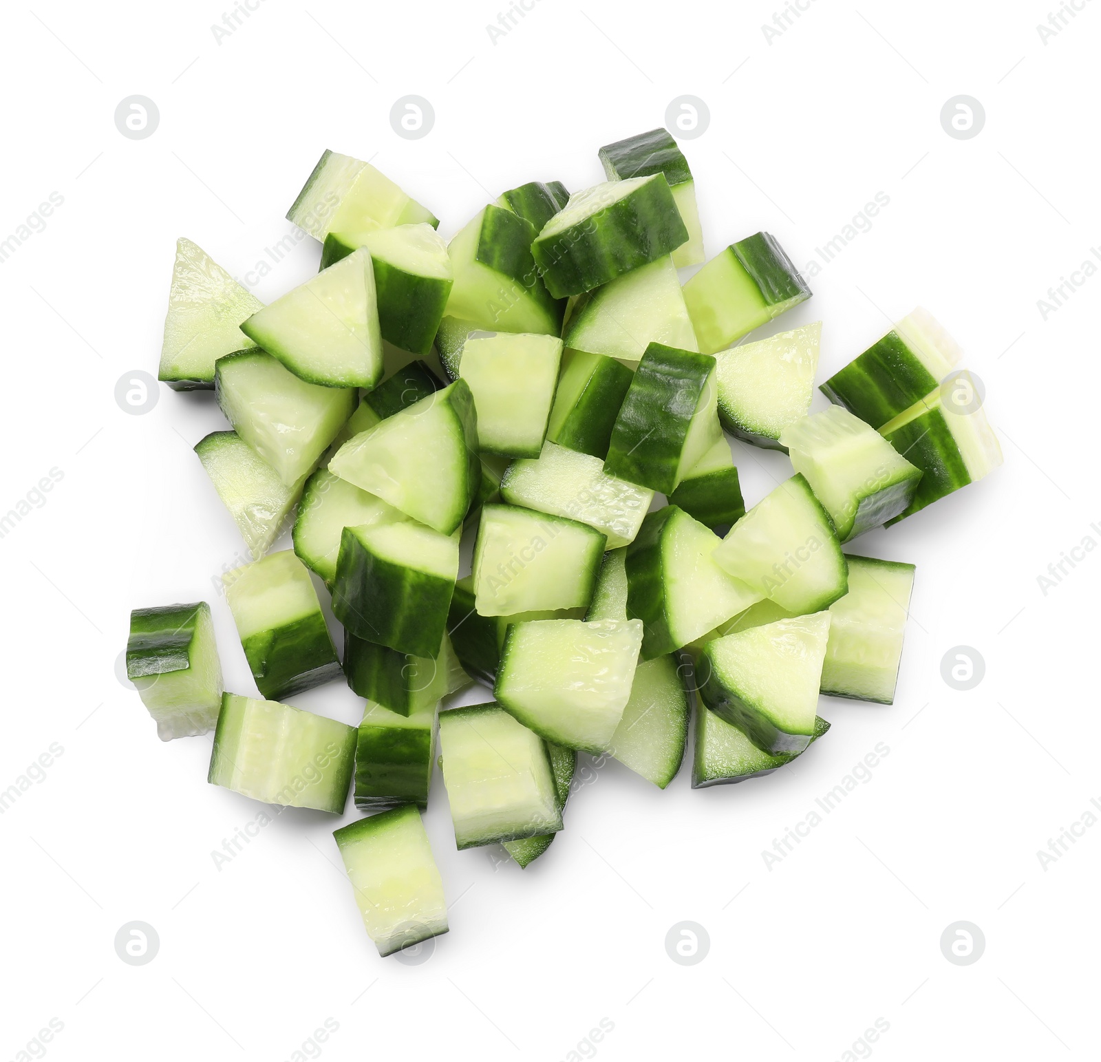 Photo of Pile of fresh cut cucumber isolated on white, top view