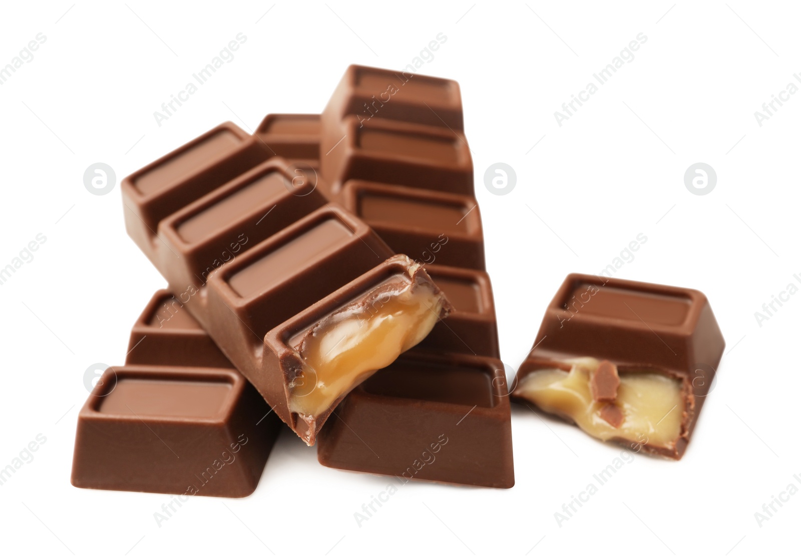 Photo of Tasty sweet chocolate bars on white table, space for text