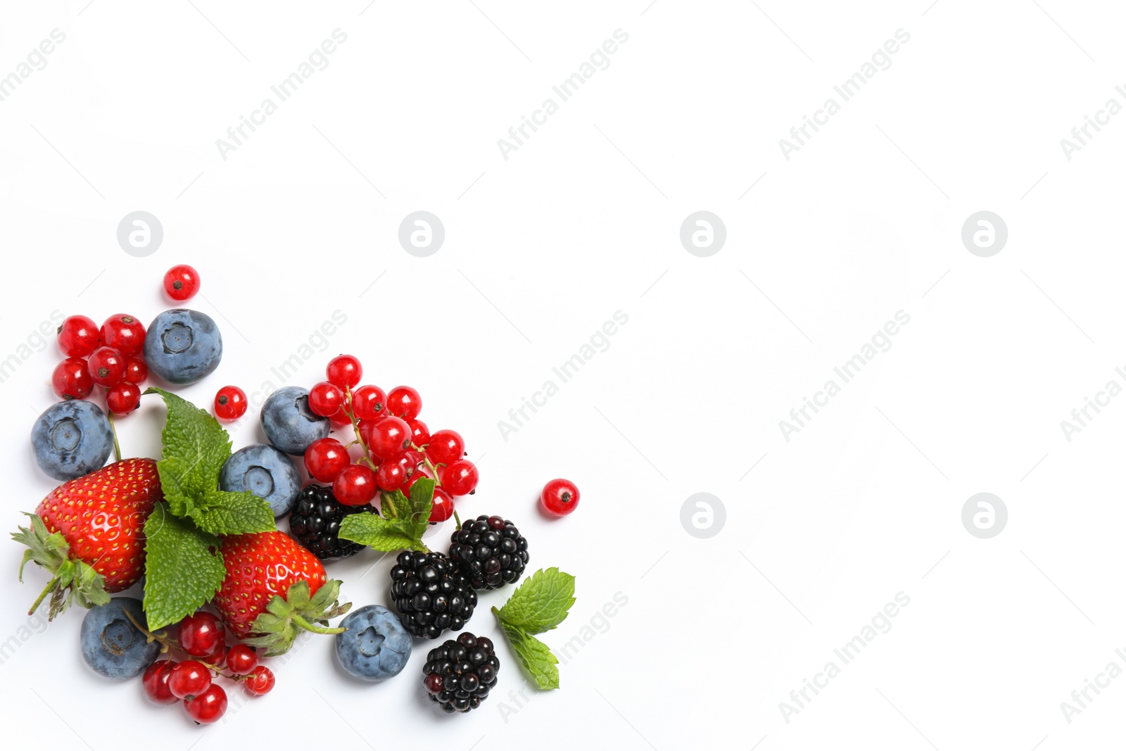 Photo of Mix of fresh berries on white background, flat lay