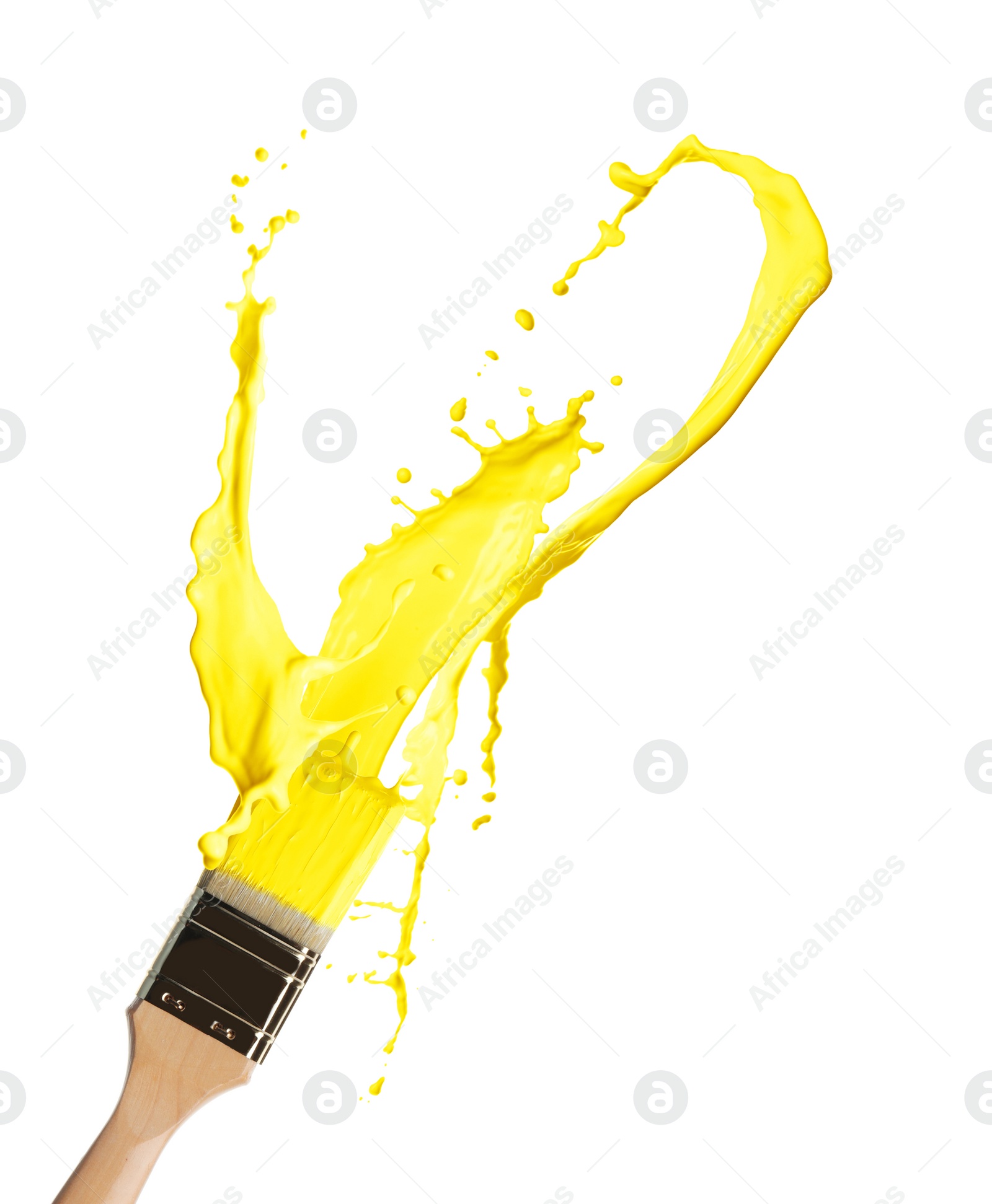 Image of Brush and splashing yellow paint on white background