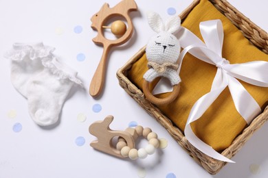 Photo of Flat lay composition with different baby accessories on white background