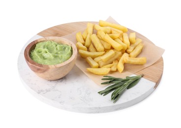 Photo of Tray with delicious french fries, avocado dip and rosemary isolated on white