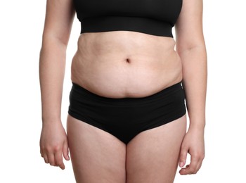 Photo of Woman with excessive belly fat on white background, closeup. Overweight problem