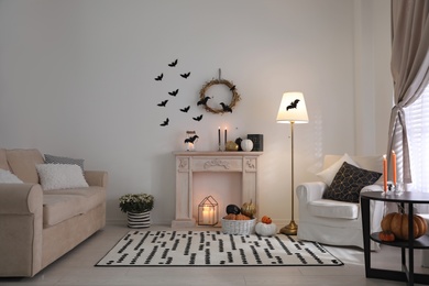 Photo of Modern room decorated for Halloween. Idea for festive interior