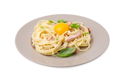 Photo of Plate of delicious pasta Carbonara with egg yolk isolated on white