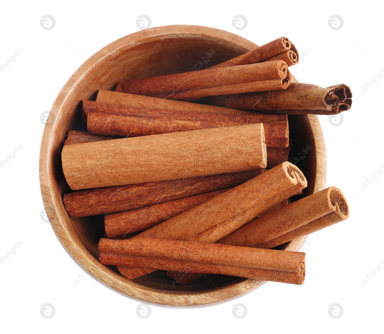 Photo of Aromatic cinnamon sticks in bowl isolated on white, top view