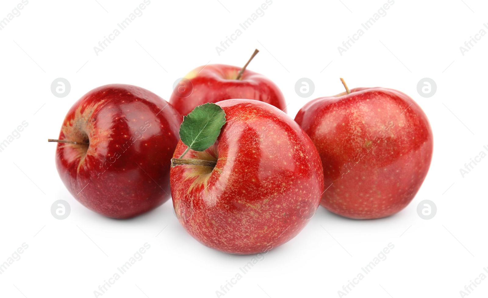 Photo of Ripe juicy red apples with leaf on white background