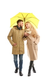 Full length portrait of beautiful couple with umbrella, isolated on white