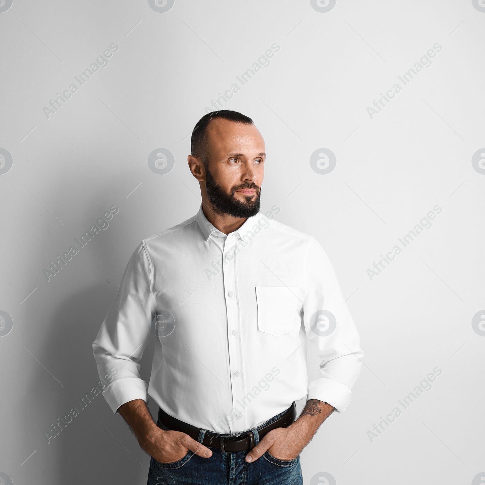 Photo of Portrait of handsome man on white background