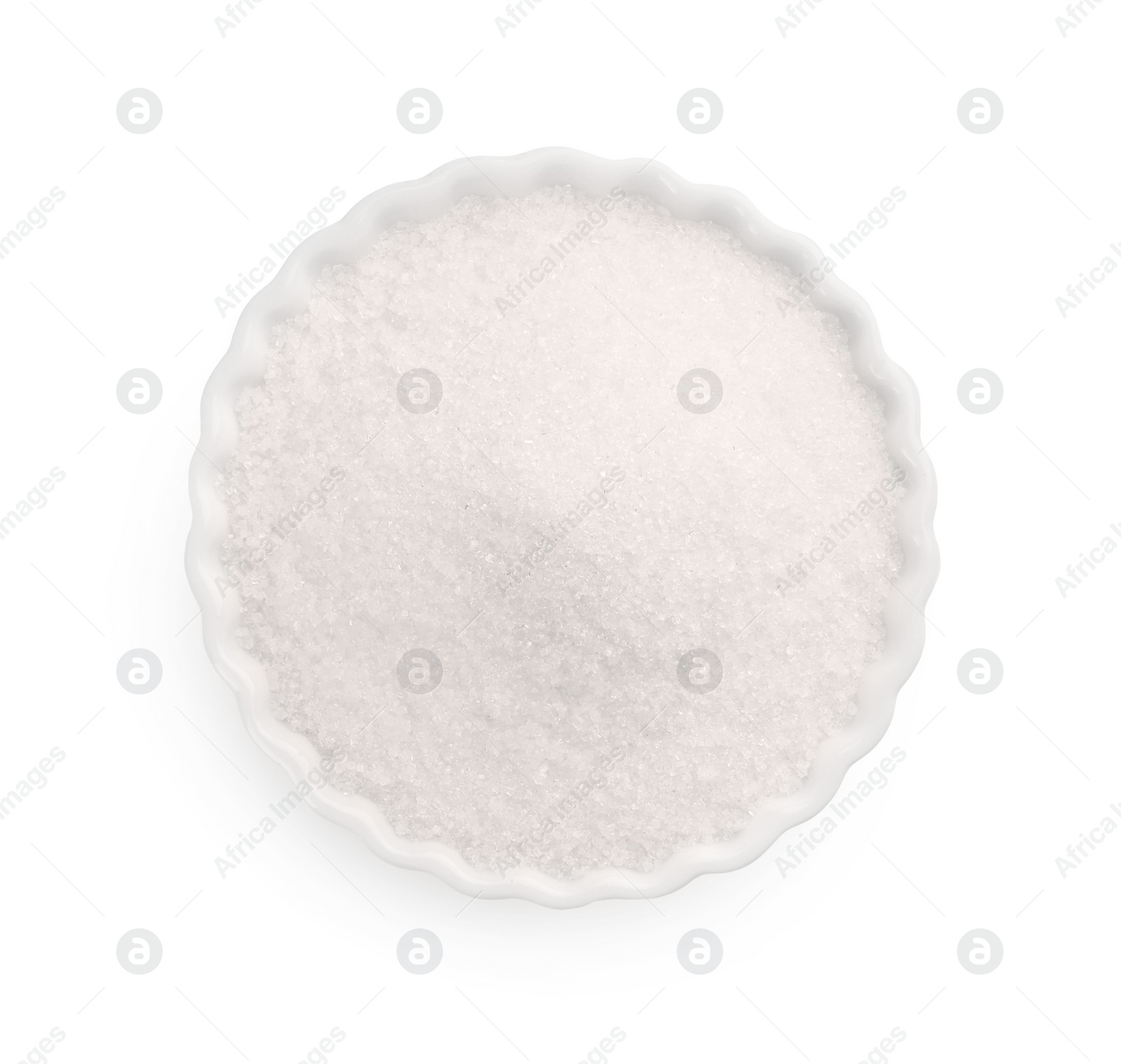 Photo of Granulated sugar in bowl isolated on white, top view