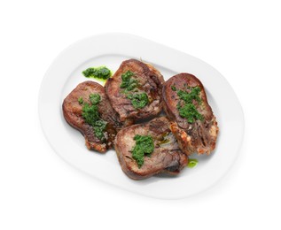 Photo of Tasty beef tongue pieces with salsa verde isolated on white, top view