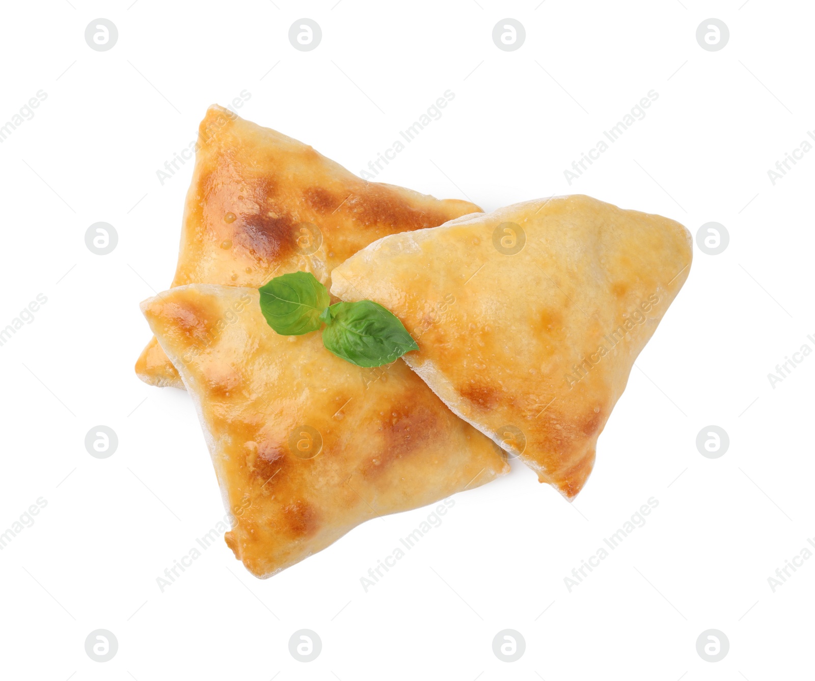 Photo of Delicious samosas and basil isolated on white, top view