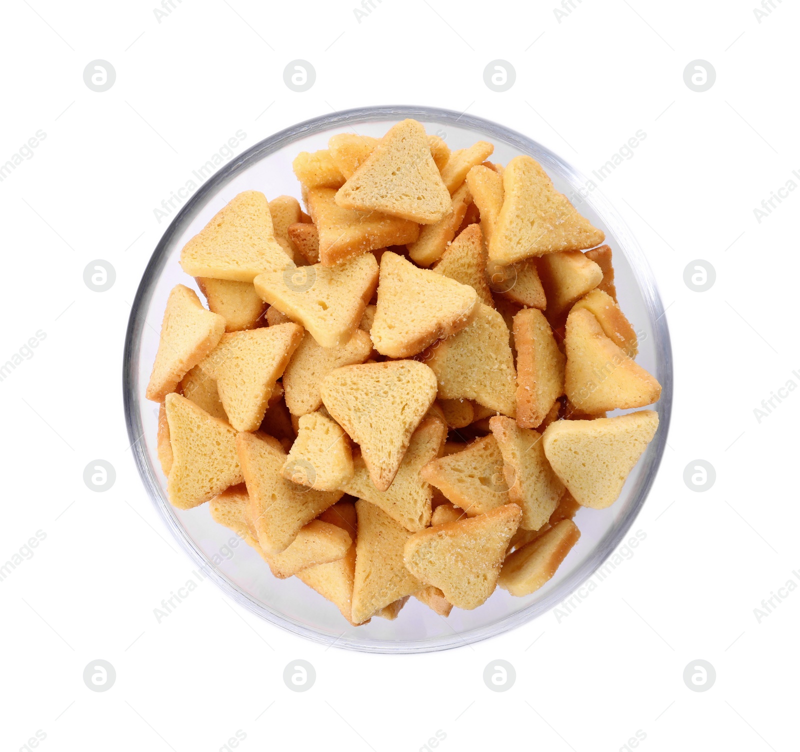 Photo of Crispy rusks in bowl isolated on white, top view