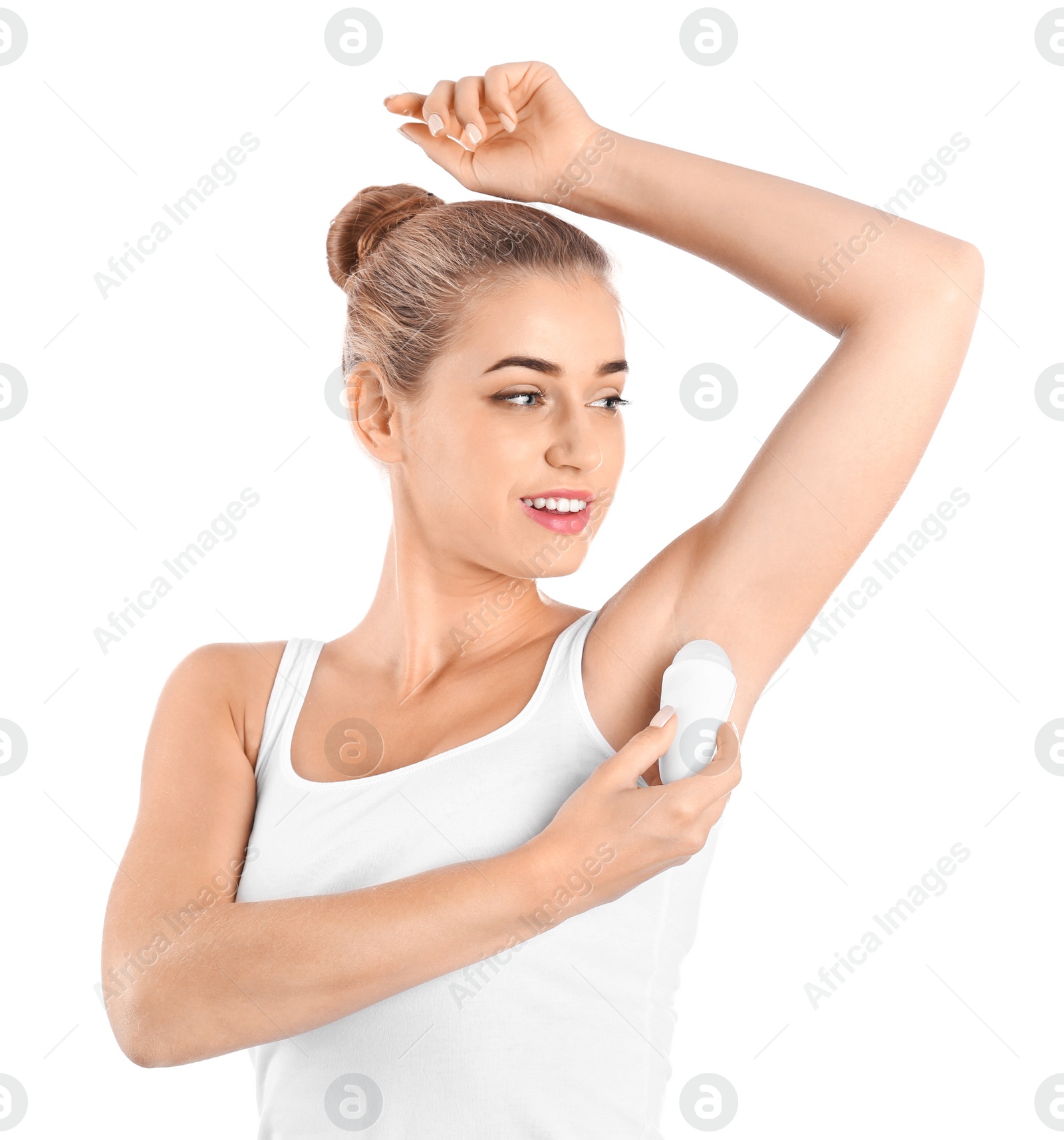 Photo of Young woman using deodorant on white background