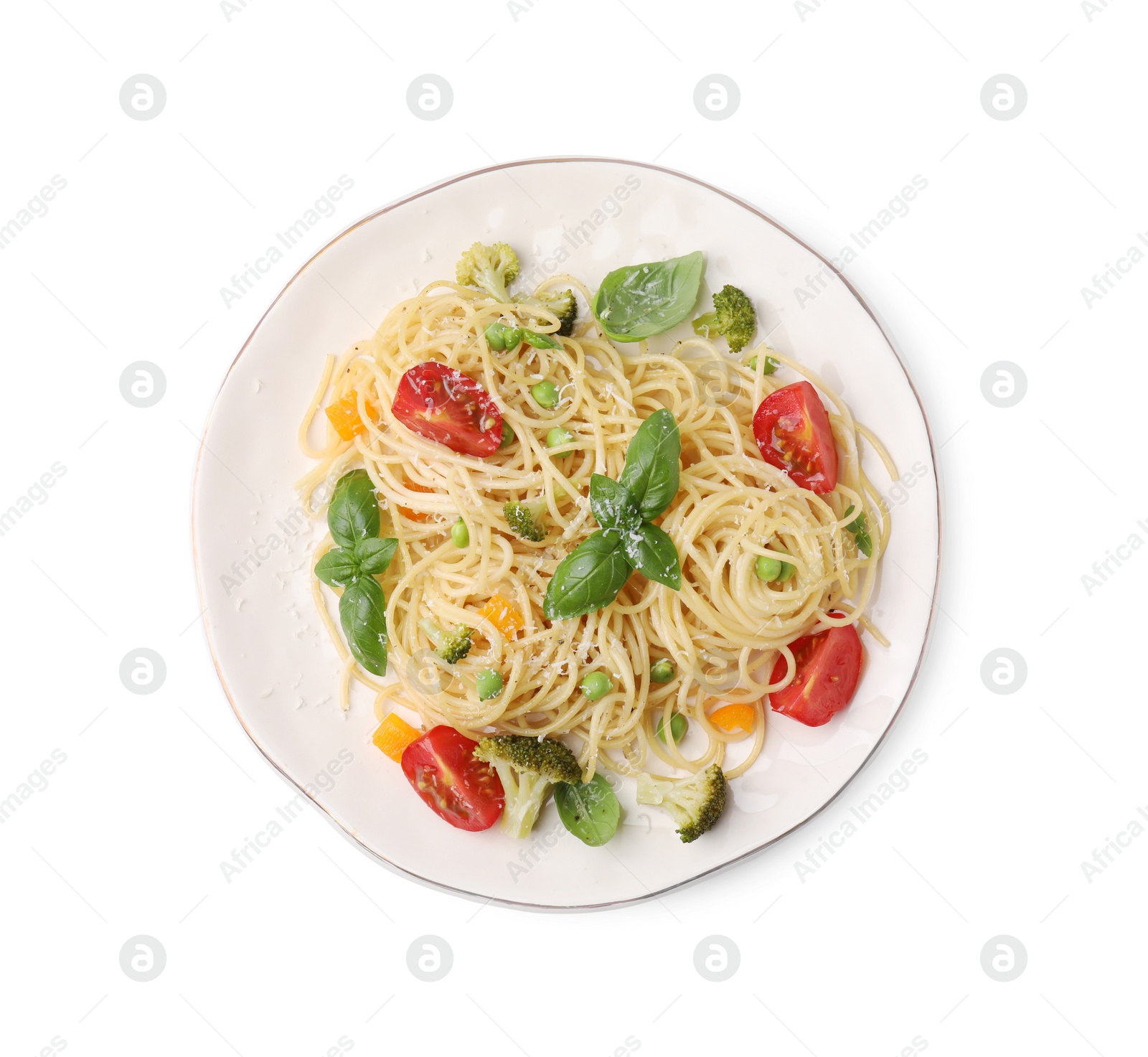 Photo of Plate of delicious pasta primavera with tomatoes, basil and broccoli isolated on white, top view