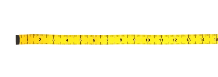 Photo of New yellow measuring tape isolated on white, top view