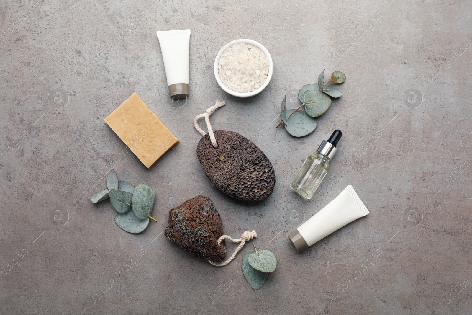 Photo of Flat lay composition with pumice stones on grey background