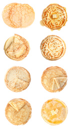 Image of Set of tasty thin pancakes on white background, top view