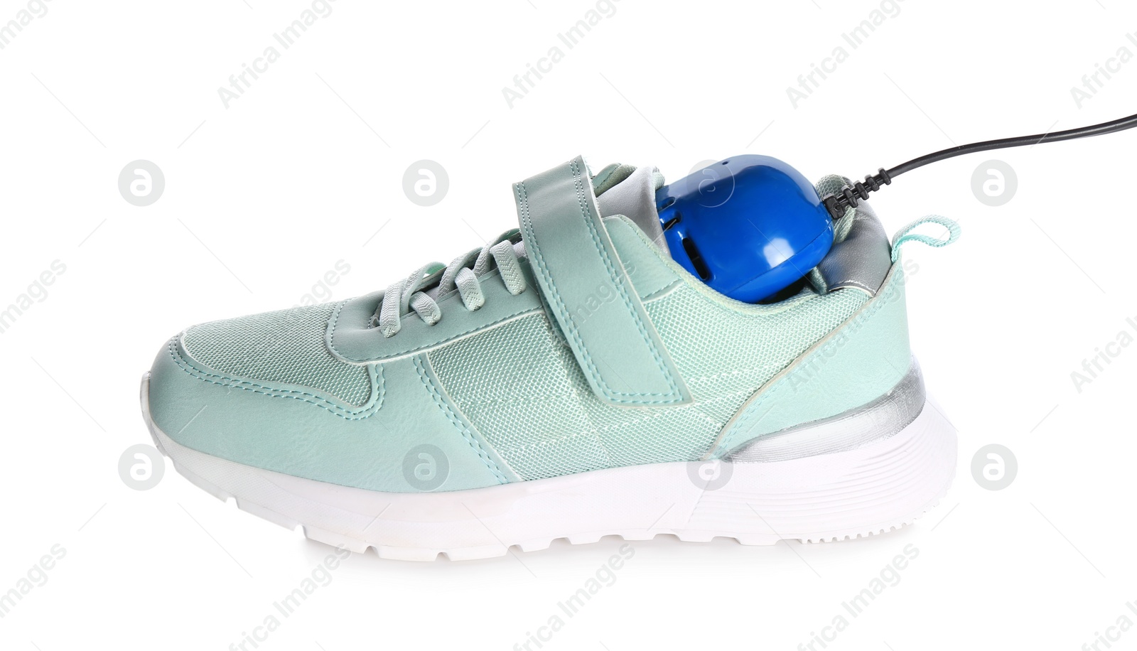 Photo of Stylish shoe with modern electric footwear dryer on white background
