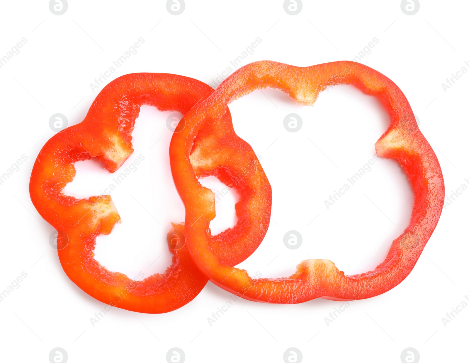 Photo of Slices of red bell pepper isolated on white