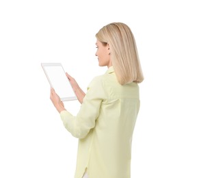 Woman holding tablet with blank screen on white background