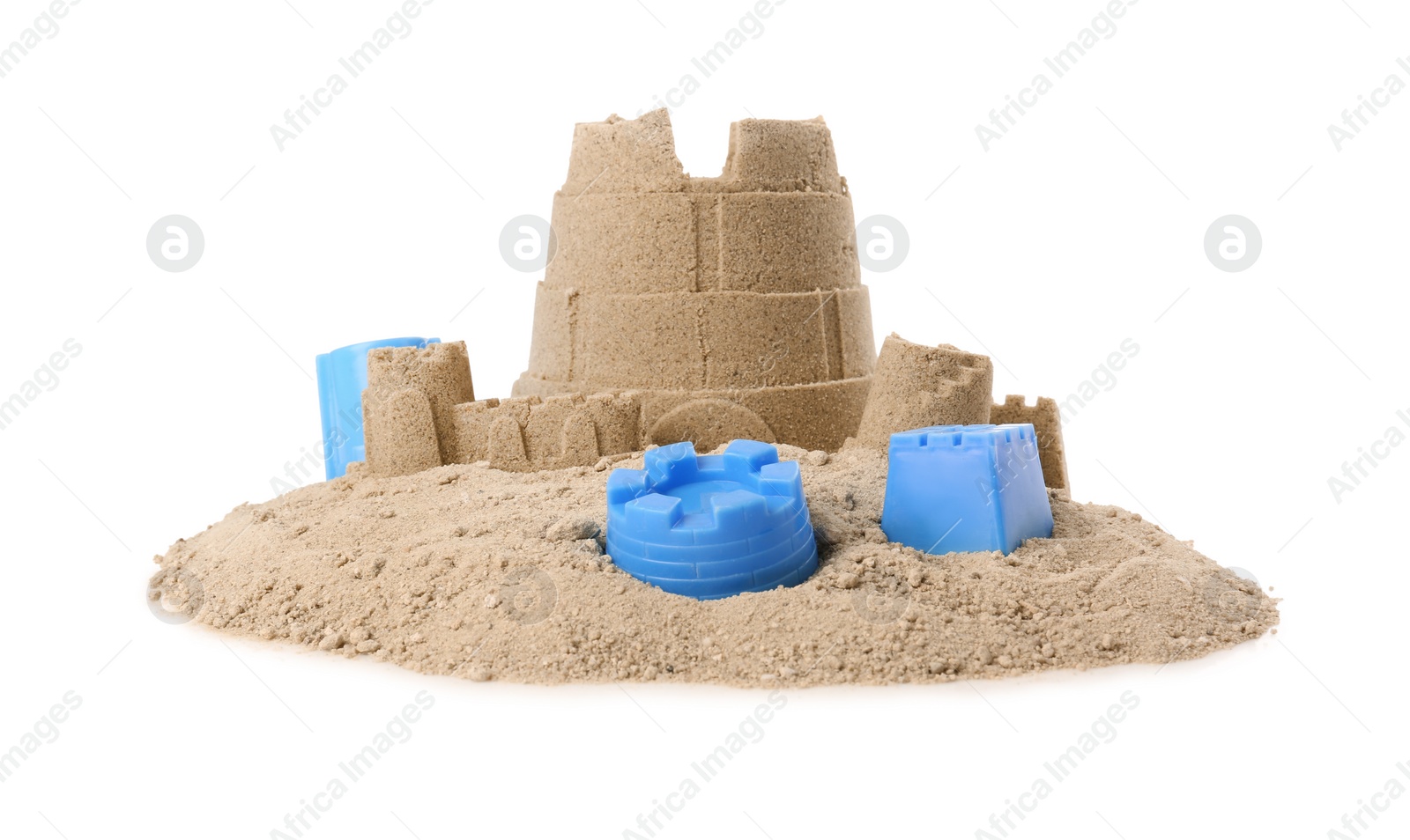 Photo of Pile of sand with beautiful castle and plastic beach toys isolated on white