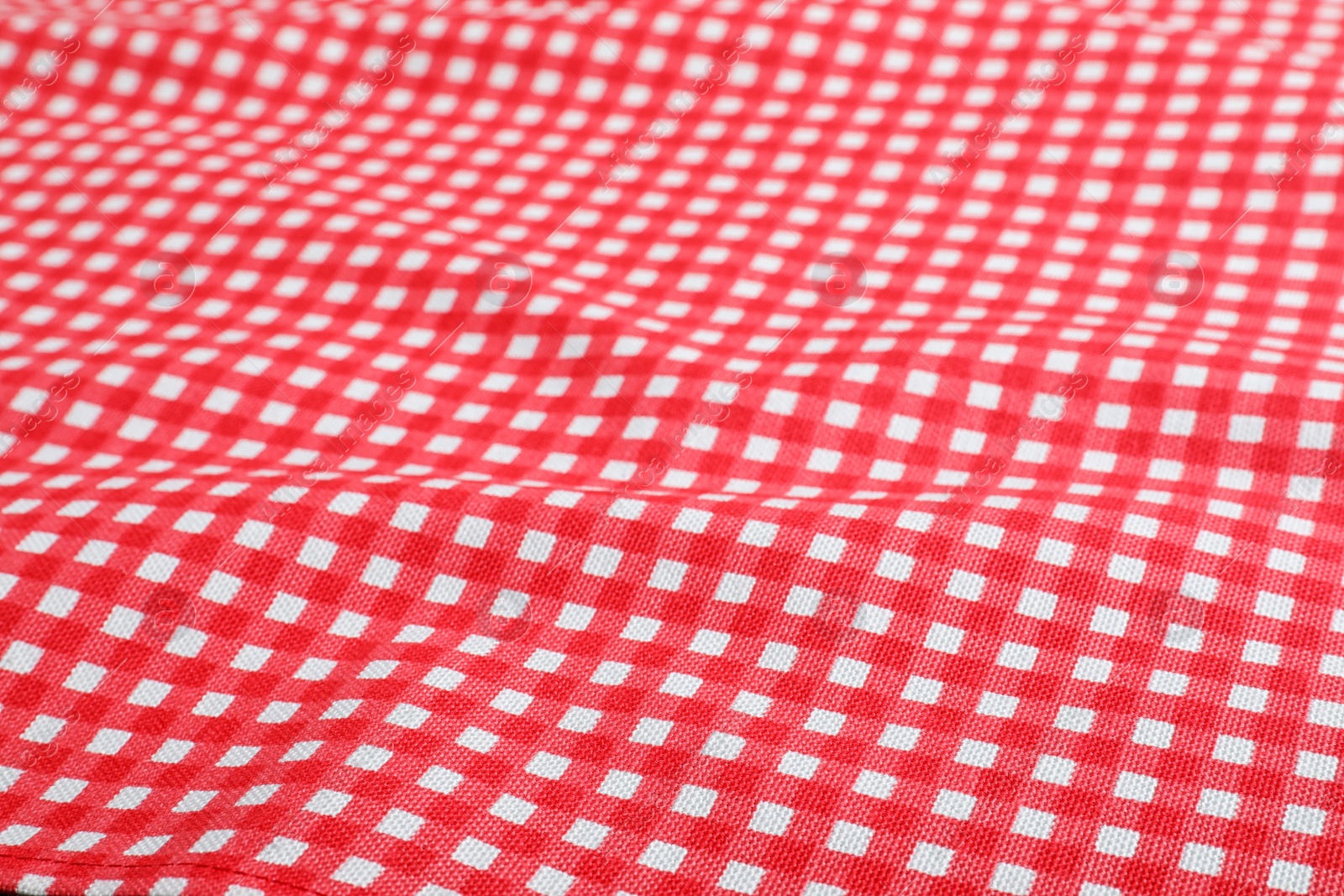 Photo of Classic red checkered picnic tablecloth as background