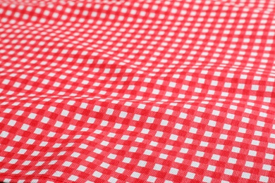 Photo of Classic red checkered picnic tablecloth as background