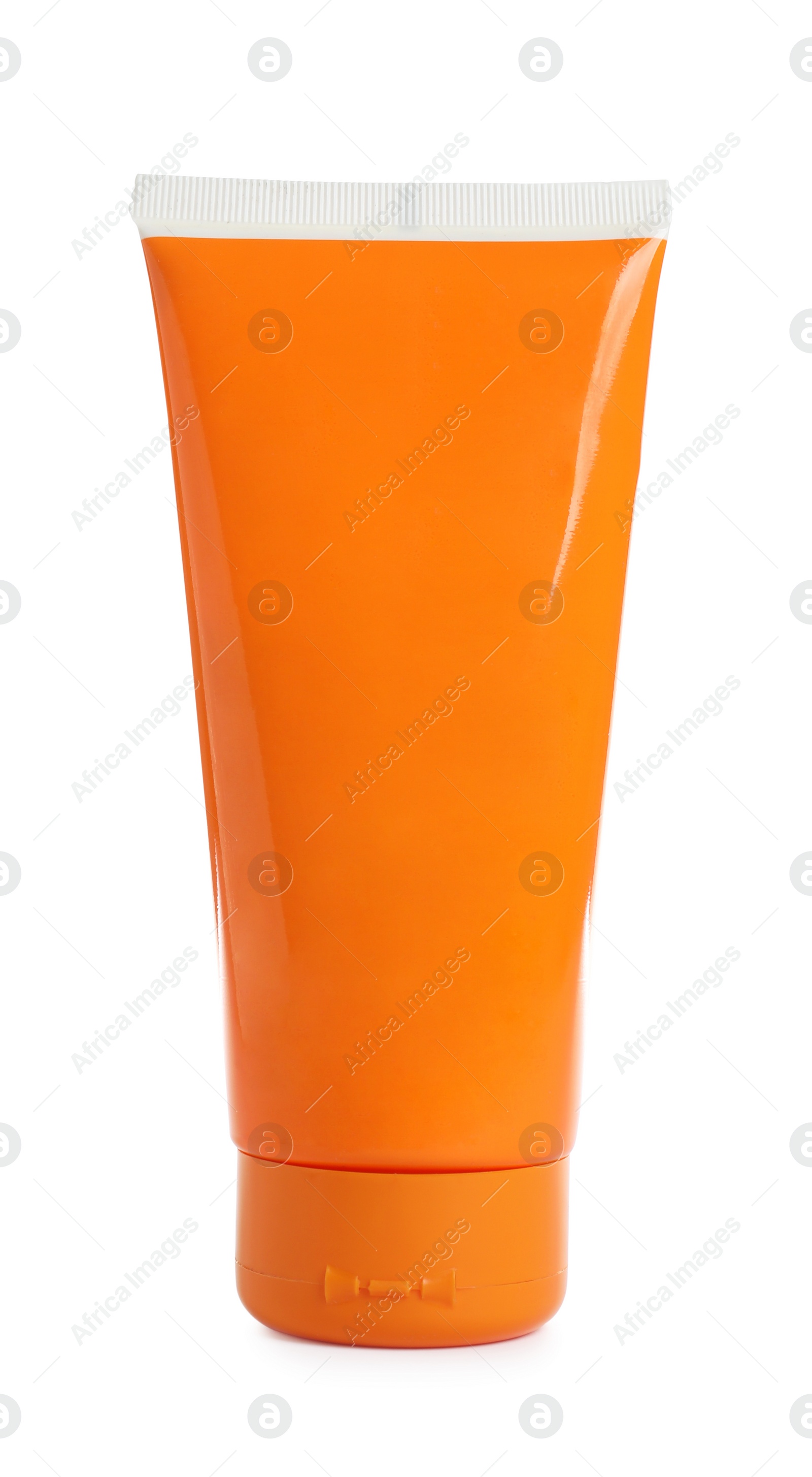 Photo of Orange tube with sun protection body cream on white background. Cosmetic product