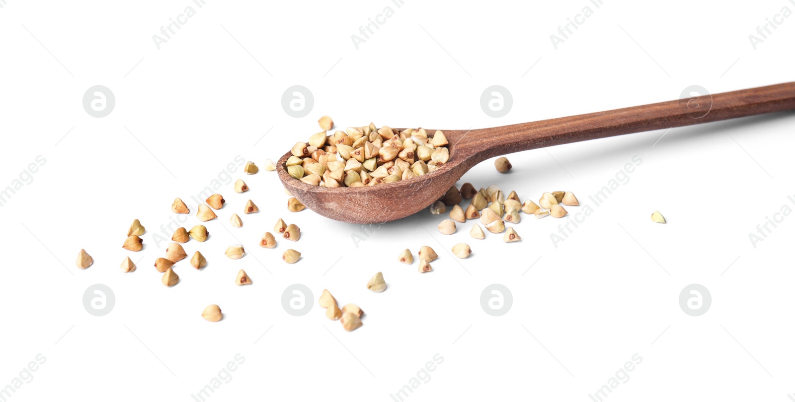 Photo of Uncooked green buckwheat grains in spoon isolated on white