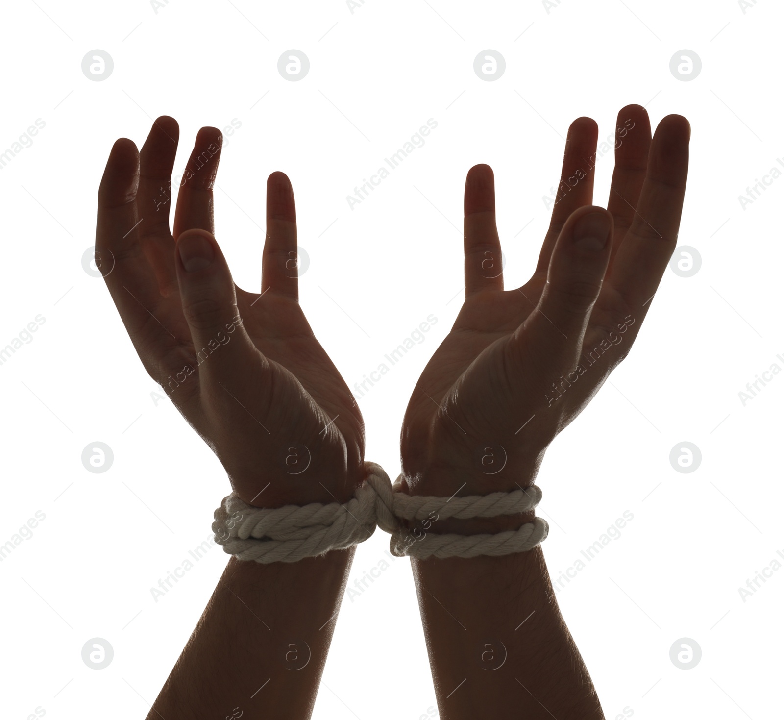 Photo of Freedom concept. Man with tied arms on white background, closeup