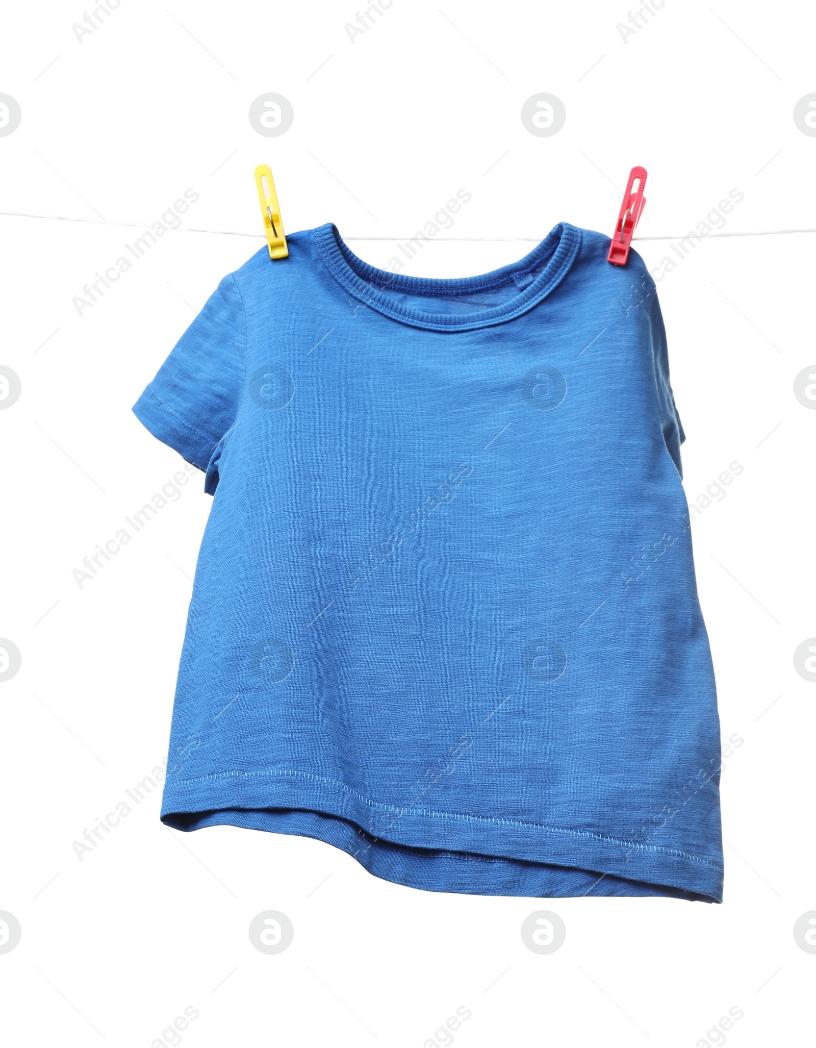 Photo of One blue t-shirt drying on washing line isolated on white