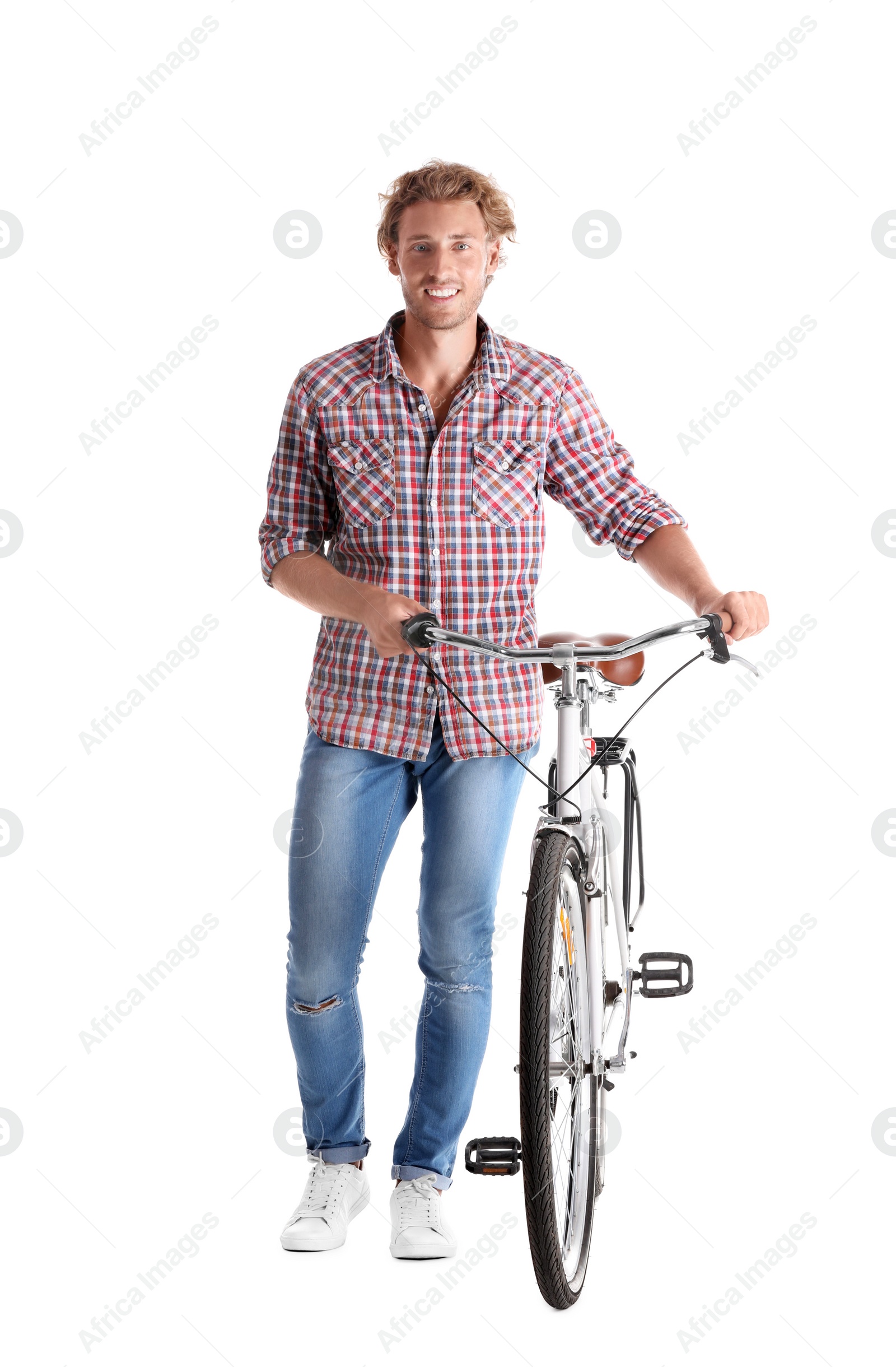 Photo of Handsome young man with bicycle on white background