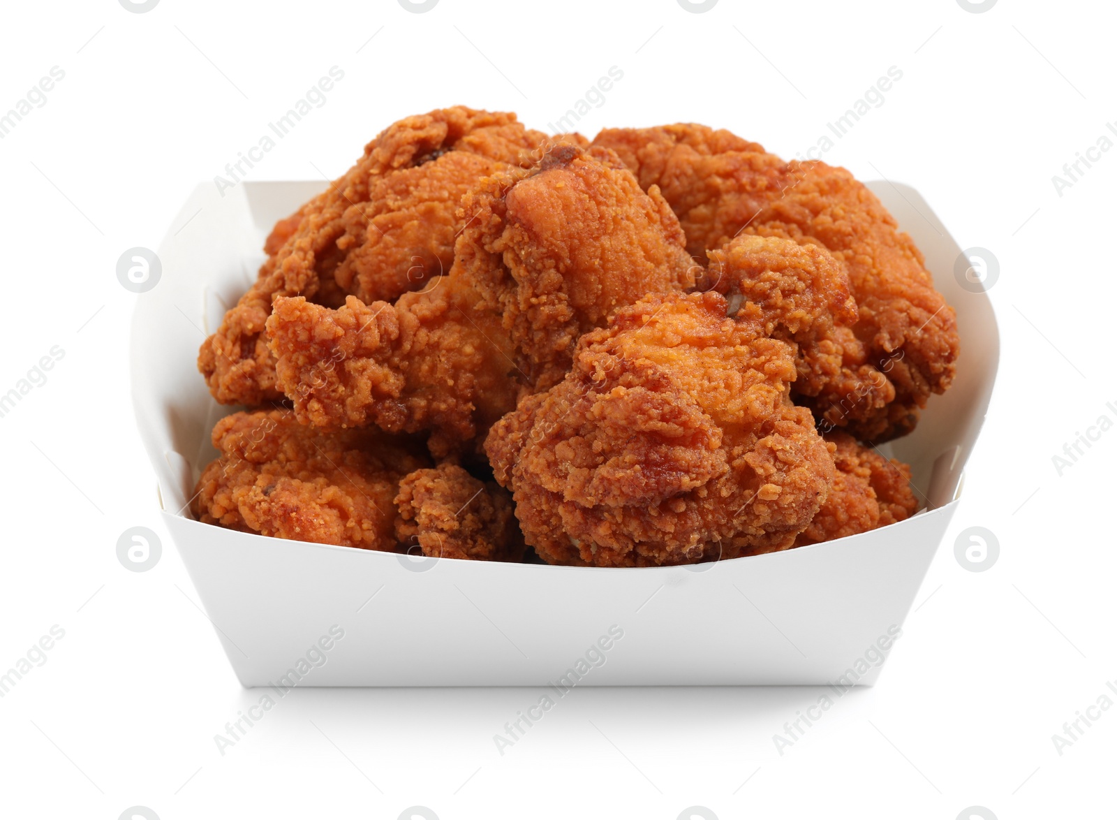 Photo of Tasty deep fried chicken pieces isolated on white