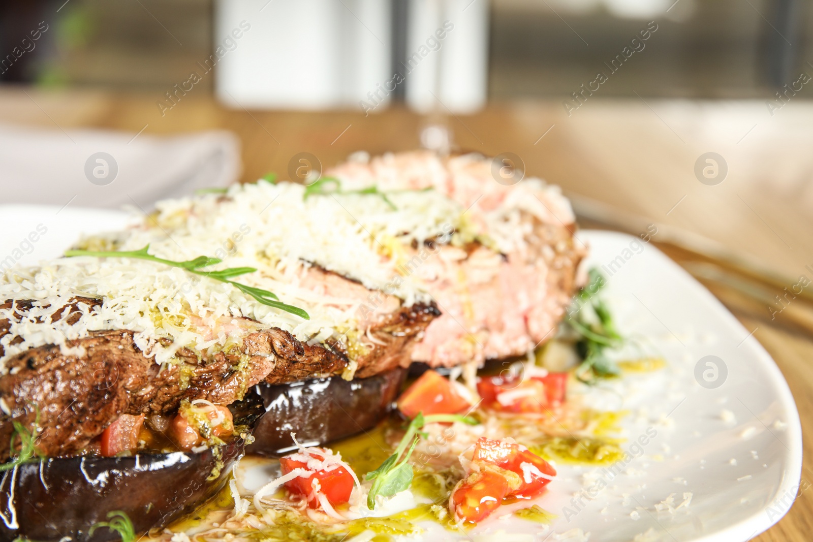 Photo of Delicious roasted meat served on plate, closeup