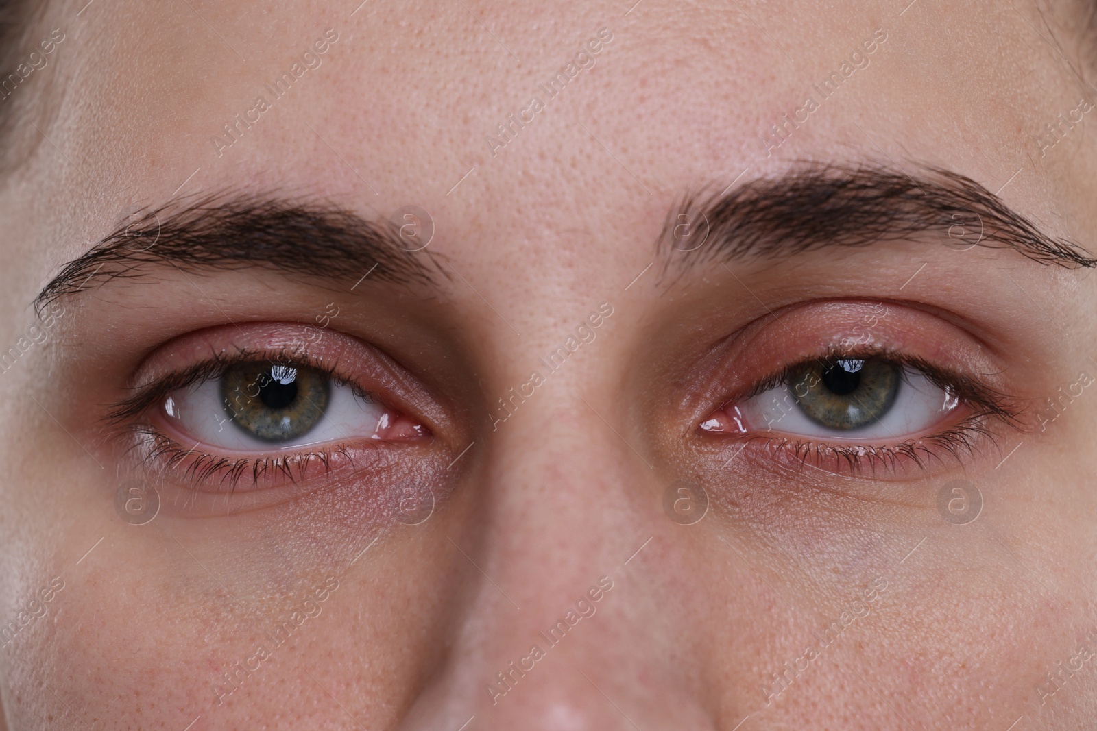 Photo of Closeup view of woman with beautiful hazel eyes