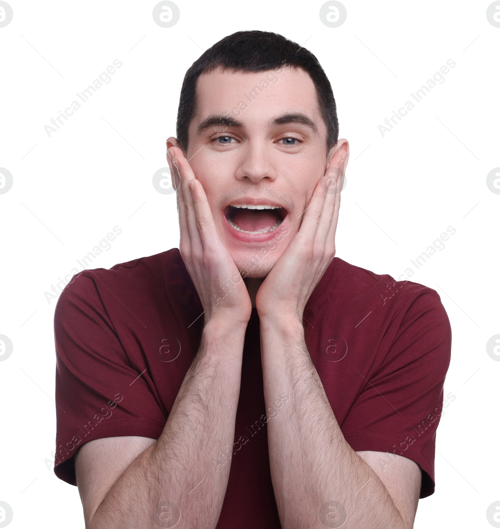 Photo of Portrait of surprised man on white background