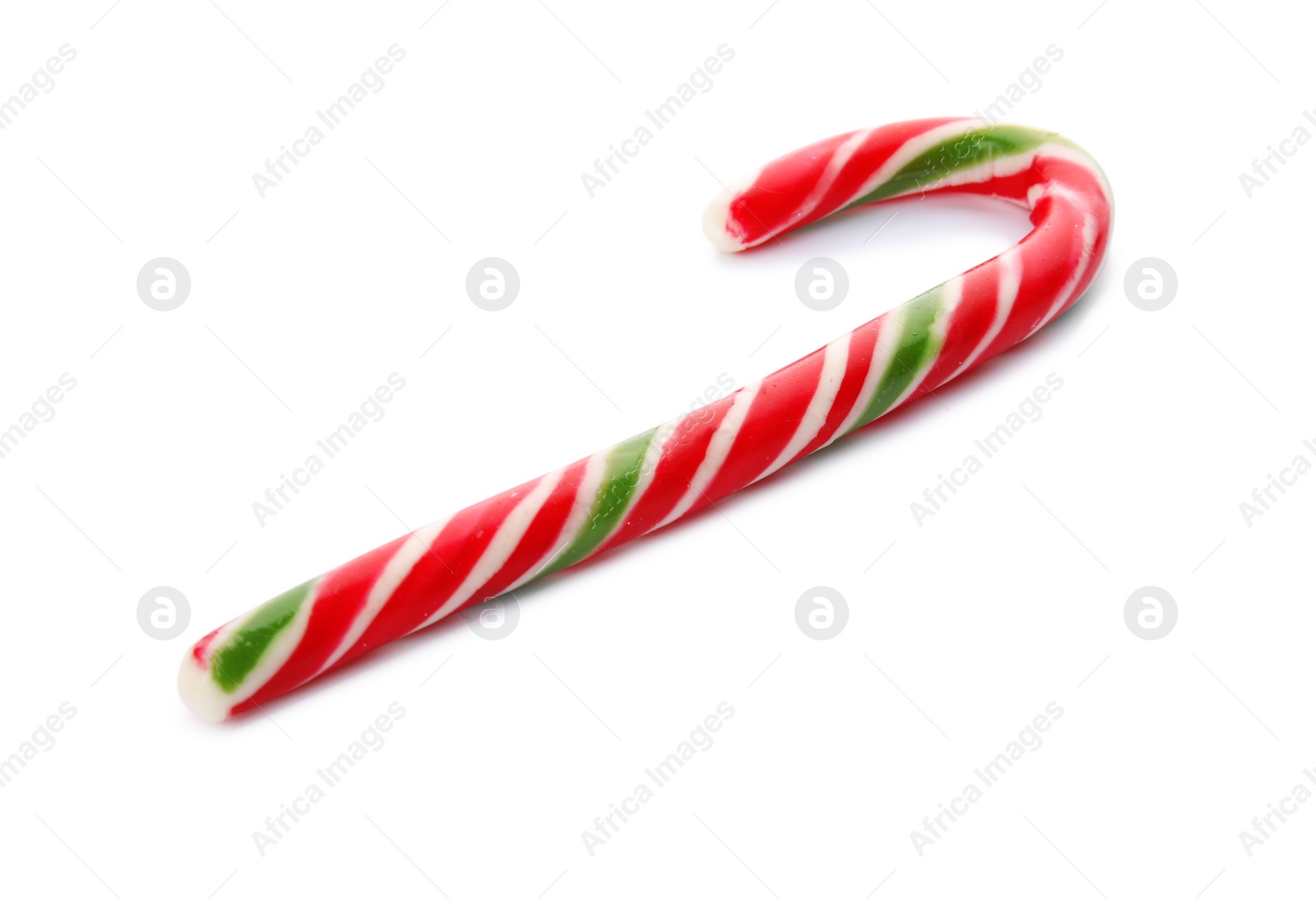 Photo of Tasty candy cane on white background. Festive treat