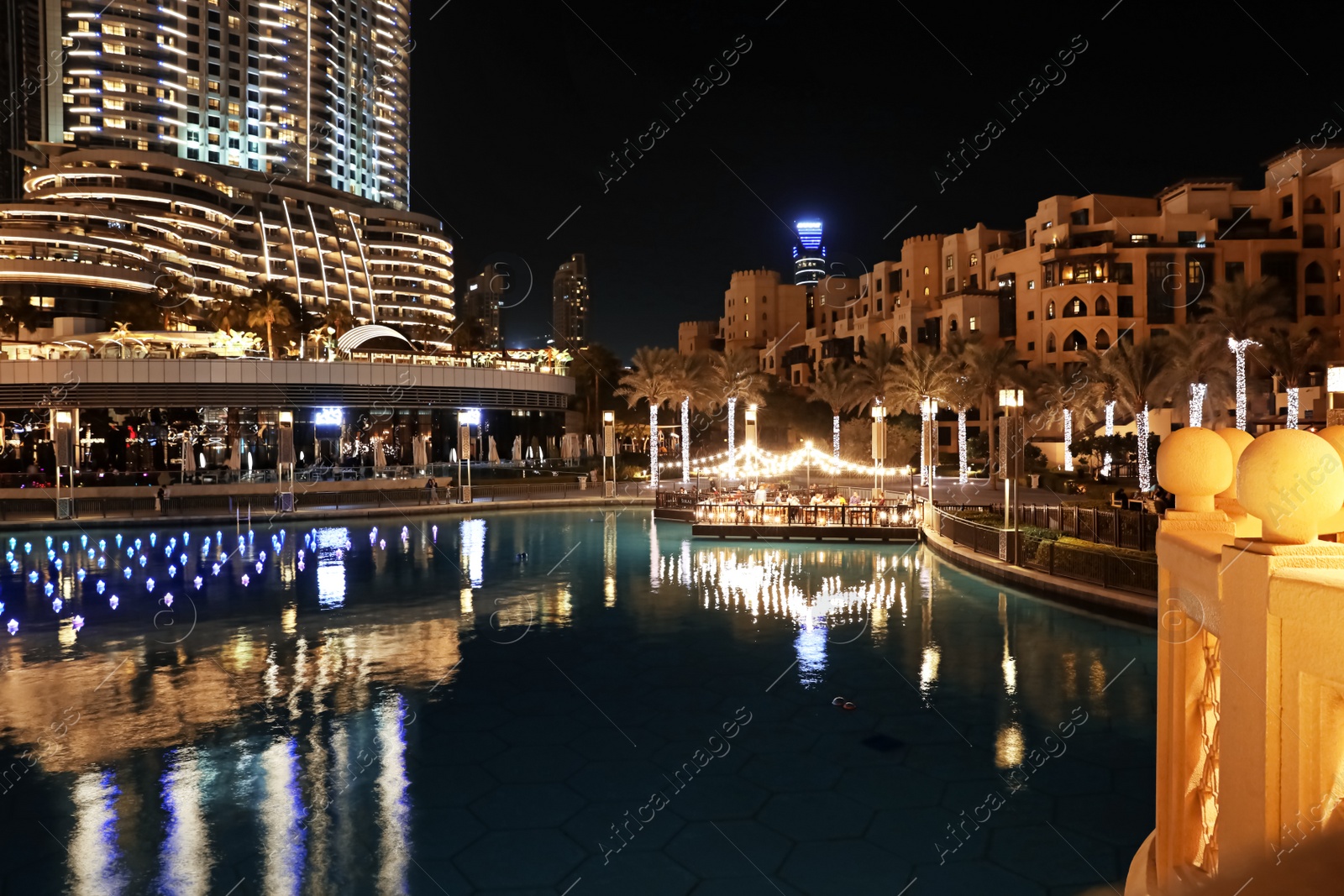 Photo of DUBAI, UNITED ARAB EMIRATES - NOVEMBER 04, 2018: Night cityscape with illuminated buildings