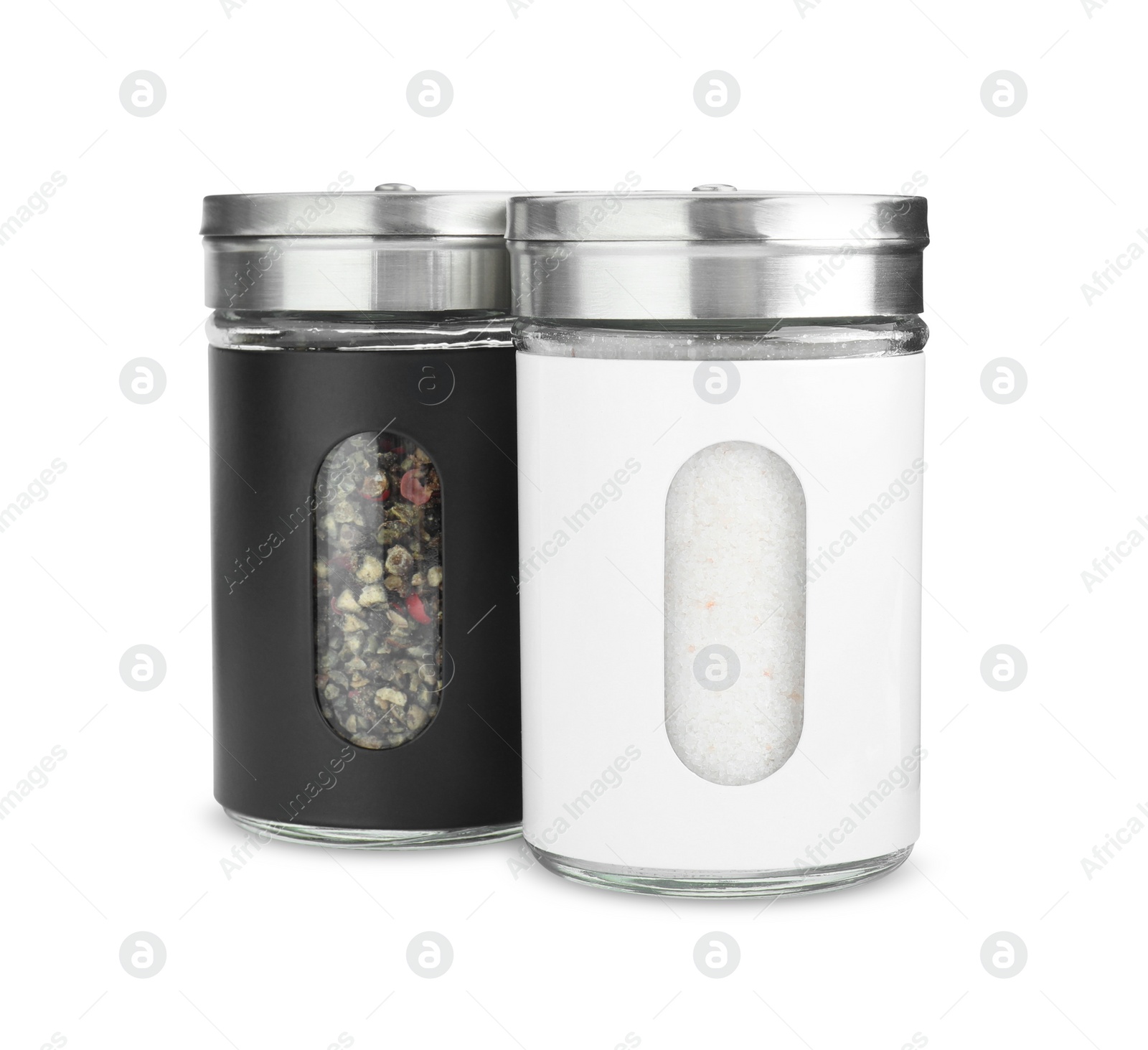 Photo of Salt and pepper shakers isolated on white