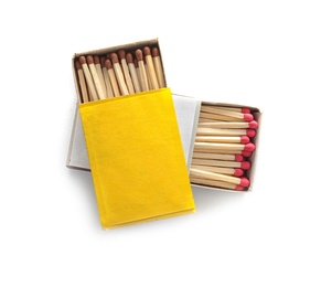 Photo of Cardboard boxes with matches on white background, top view. Space for design