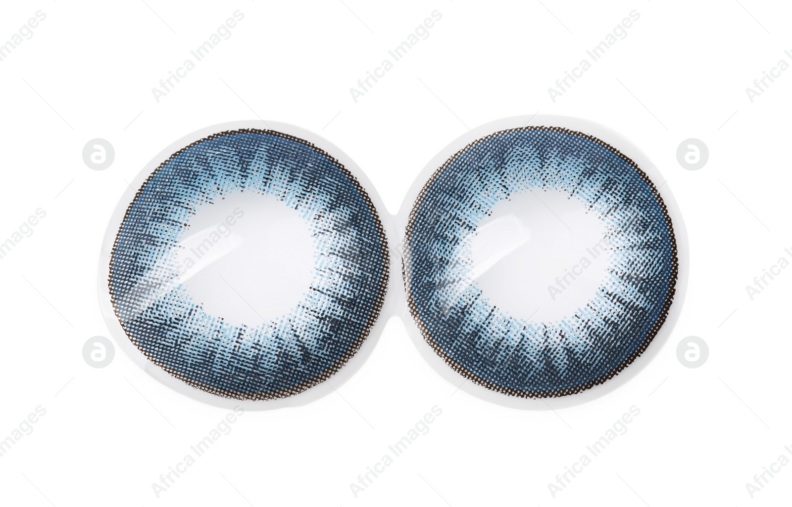 Photo of Two blue contact lenses isolated on white, top view