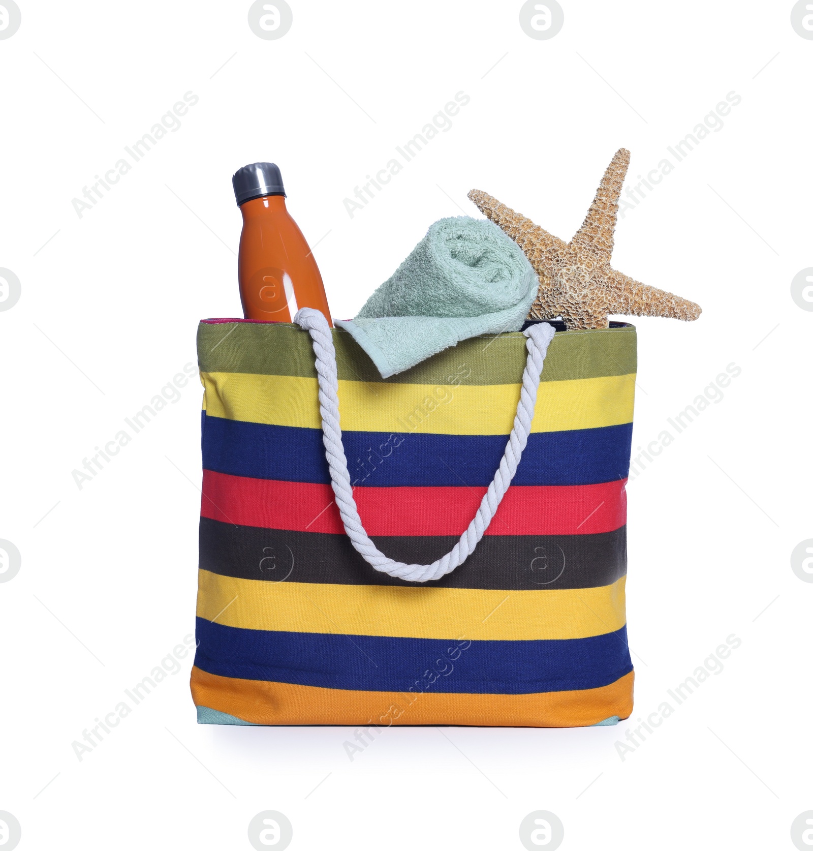 Photo of Beach bag with towel, thermo bottle and starfish isolated on white