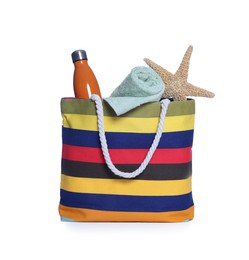 Photo of Beach bag with towel, thermo bottle and starfish isolated on white
