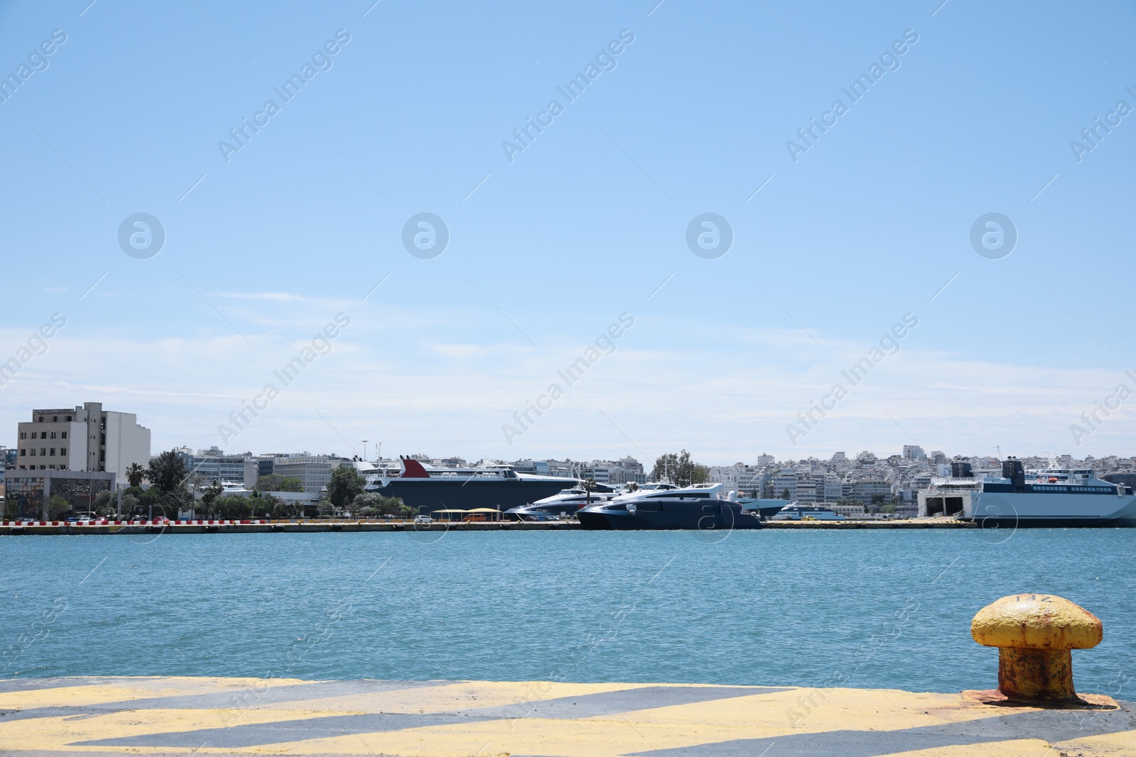 Photo of Picturesque view of port with modern boats on sunny day